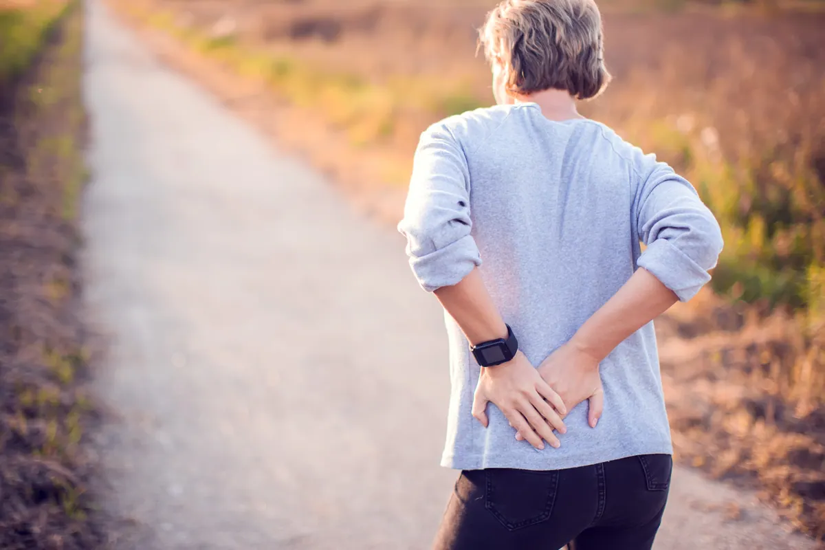 People, healthcare and problem concept – unhappy woman suffering