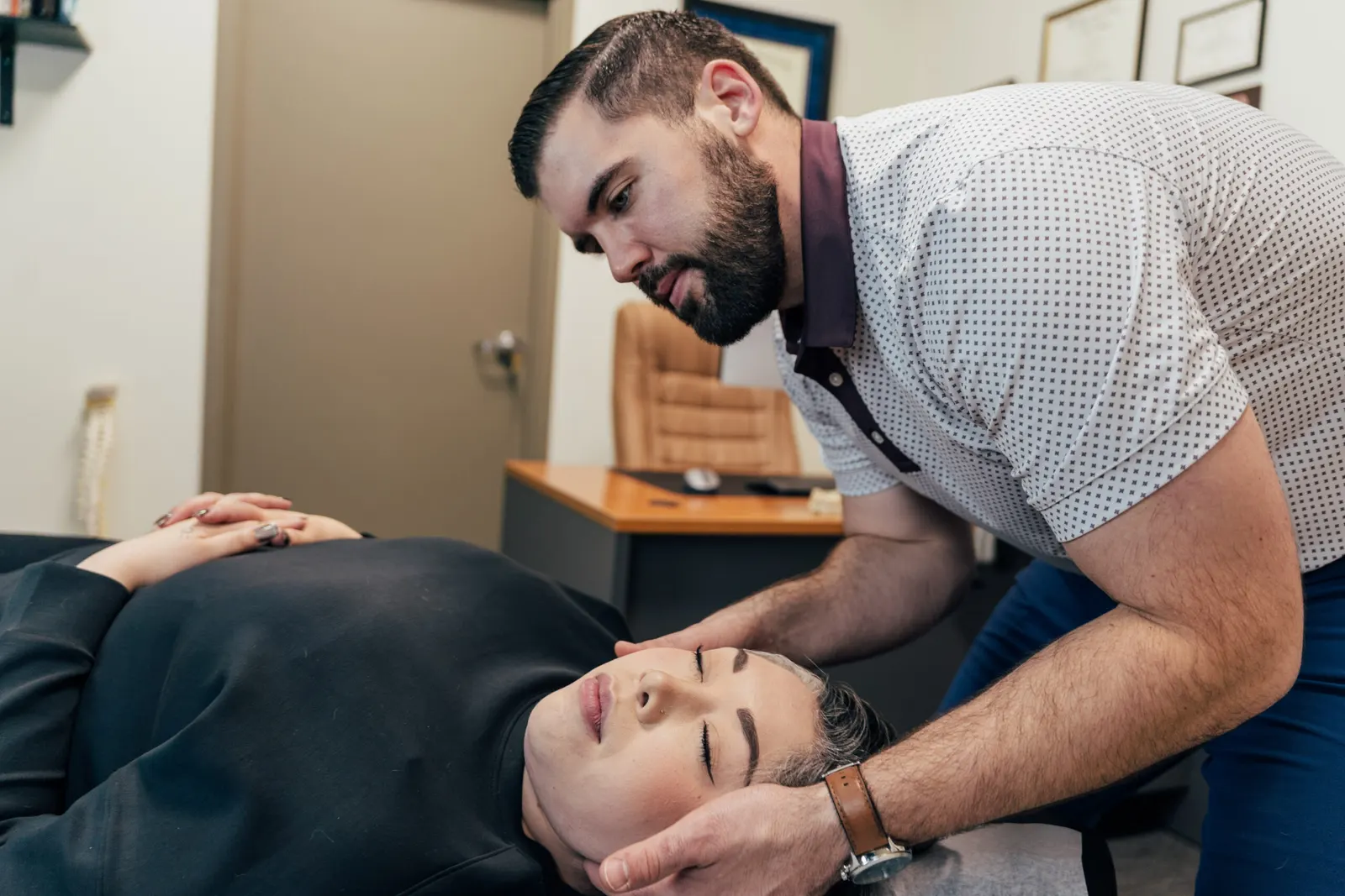 Dr Brent Johnson giving a head massage